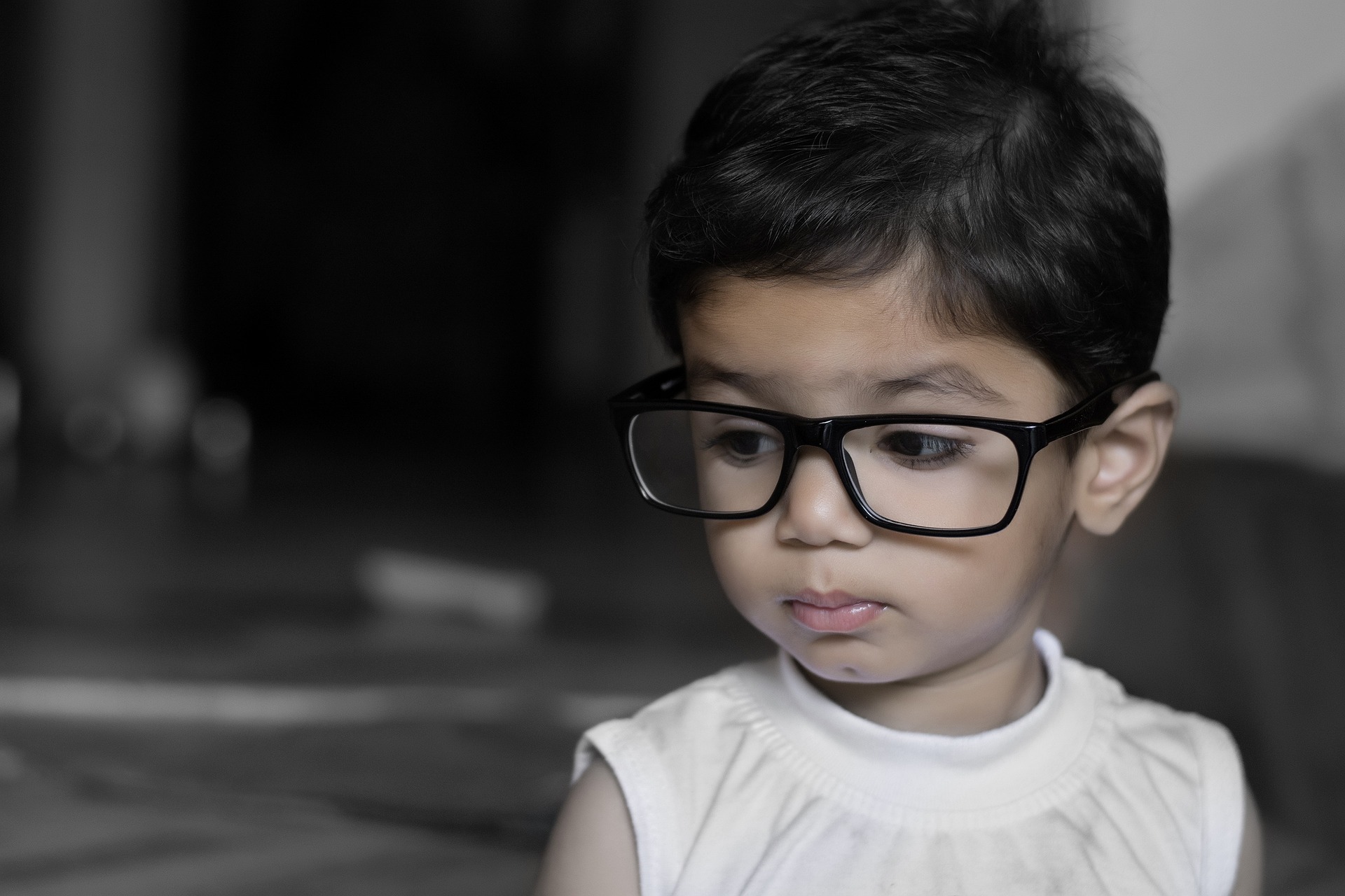 child with glasses